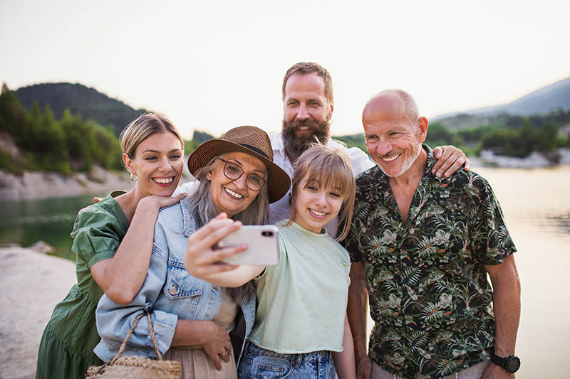 Family gathered around for a selfie